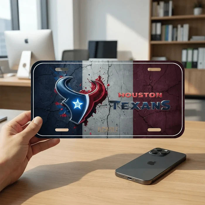 NFL team License Plate featuring Houston Texans logo on a cracked background, showcasing team pride and vibrant colors.