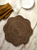 Ayre scalloped rattan placemat in antique brown on marble table with linen napkin and glassware