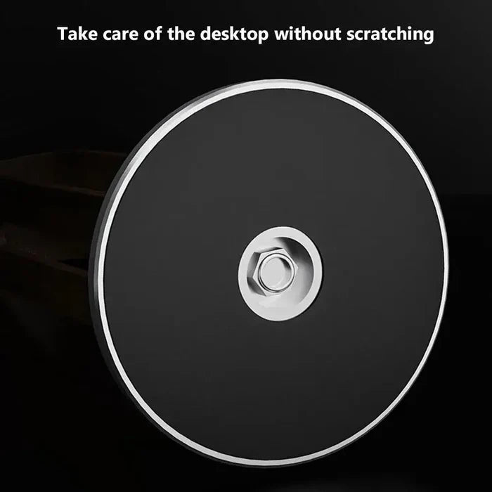 Close-up of a round black and silver desk accessory part designed to protect the desktop from scratches, related to the Bamboo Headphone Stand for organizing headphones neatly.