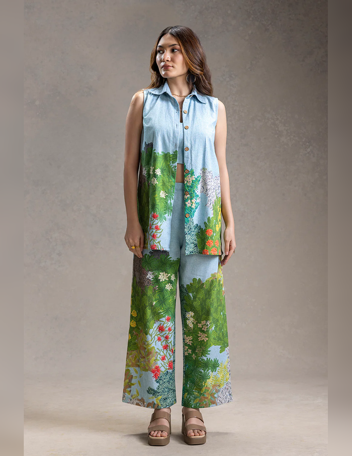 Blue Blume printed bustier with bootcut pants and sleeveless twill cotton jacket for women, featuring an elegant botanical-inspired print and contemporary silhouette.
