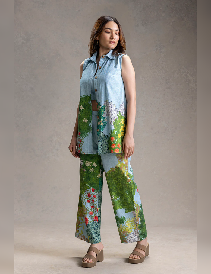 Blue Blume printed bustier with bootcut pants and sleeveless twill cotton jacket for women, featuring an elegant botanical-inspired print and contemporary silhouette.