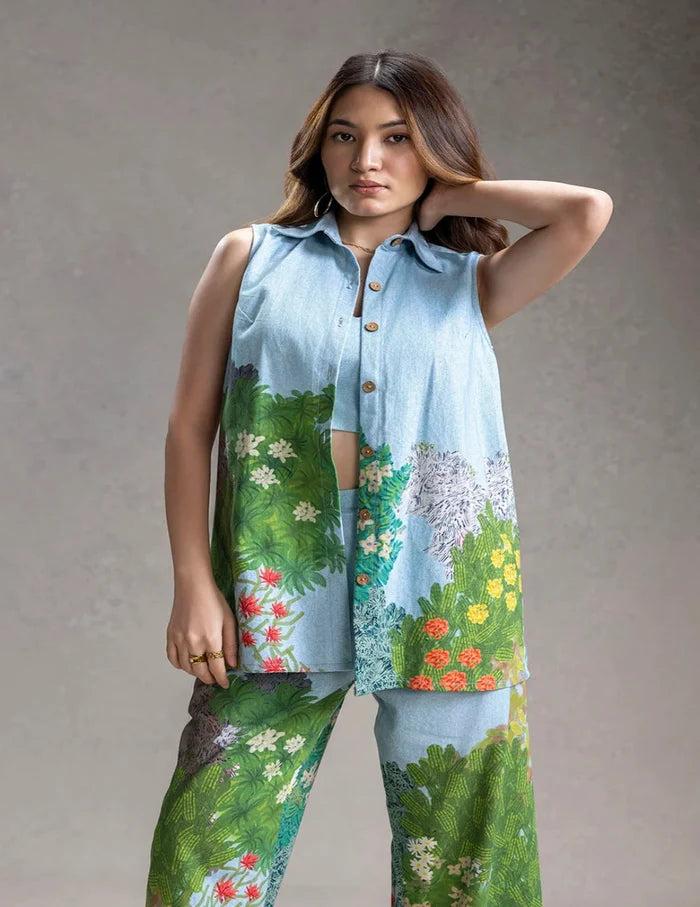 Blue Blume printed bustier with bootcut pants and sleeveless twill cotton jacket for women, featuring an elegant botanical-inspired print and contemporary silhouette.