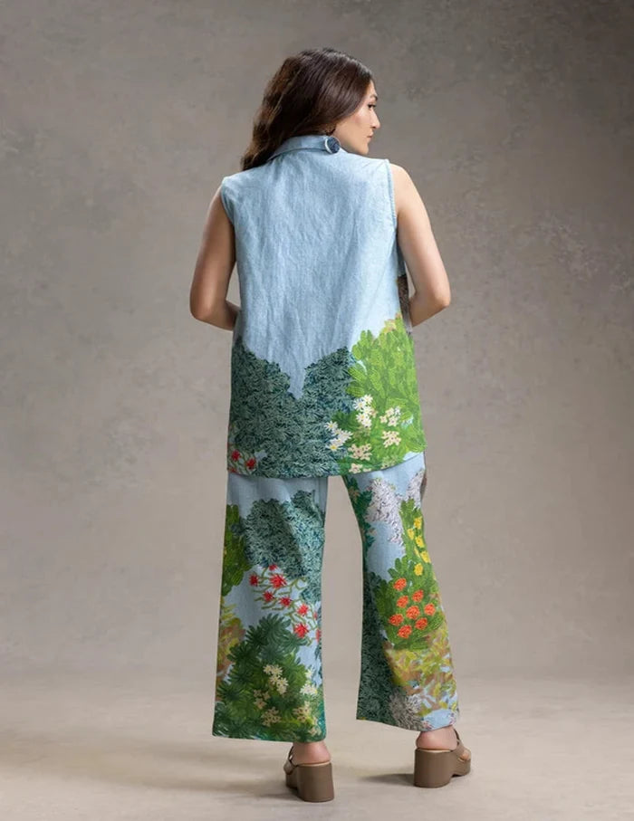 Blue Blume printed bustier with bootcut pants and sleeveless twill cotton jacket for women, featuring an elegant botanical-inspired print and contemporary silhouette.