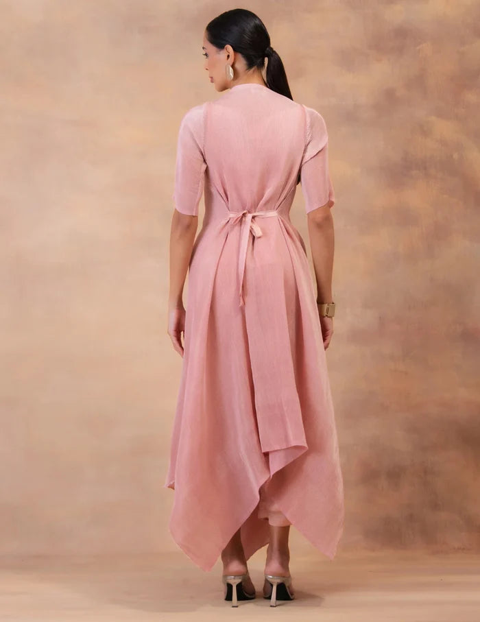 Model wearing the 'BLUSH PINK' layered tunic drape-dress set with matching pants, crafted in micro-pleated georgette satin with gold foil detailing in Singapore.