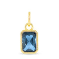 December birthstone charm with blue topaz-inspired faceted stone and 18K gold dipped setting
