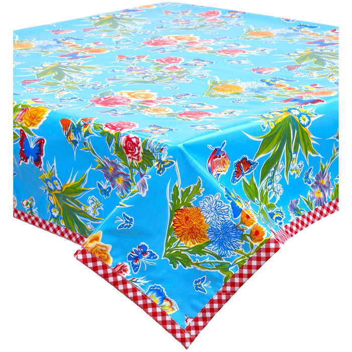 freckled sage edgar's butterfly light blue oilcloth tablecloth with red gingham trim