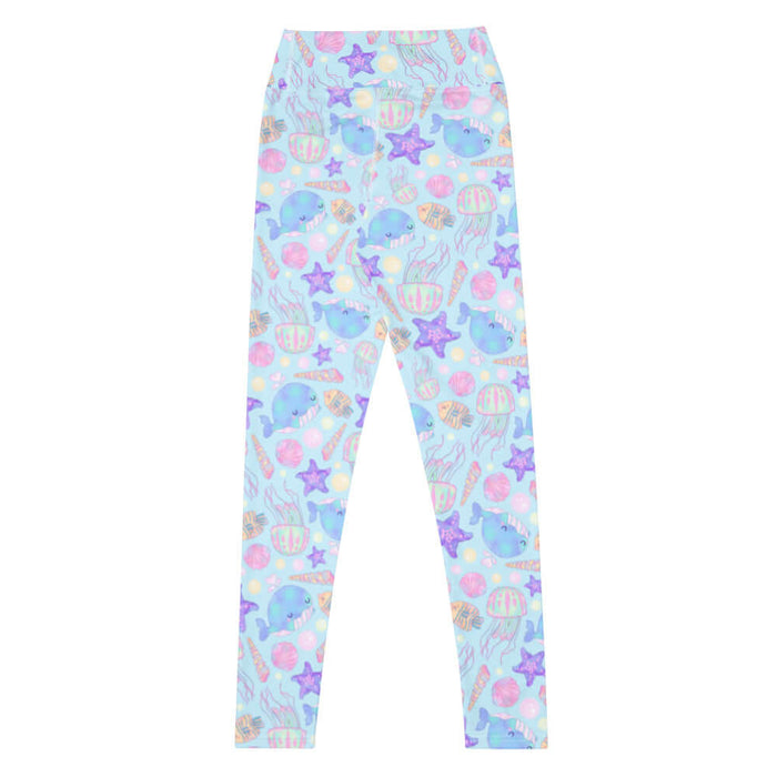 Under the Sea kawaii high-waisted leggings in blue with peach-striped tropical fish and golden bubbles