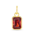 January birthstone charm with deep red garnet-inspired stone and 18K gold dipped setting