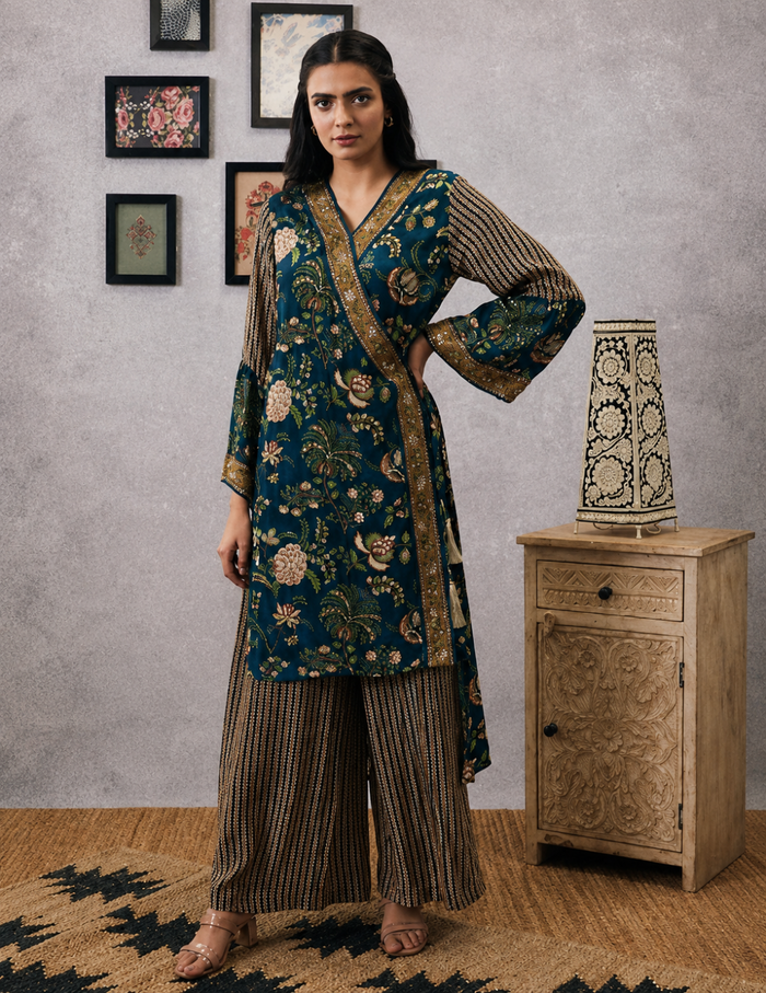 Green Mehr Embroidered High-Low Angarkha Top and Flared Pants in Crepe with intricate embroidery and elegant flared silhouette for festive and occasion wear.