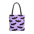 Stylish Morrigan Tote Bag (Black/Purple) featuring a unique bat design, perfect for any outfit or occasion.