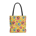 Bright and fun, the Pan Dulce Tote Bag (Yellow) features delightful baked treats, perfect for any outfit.