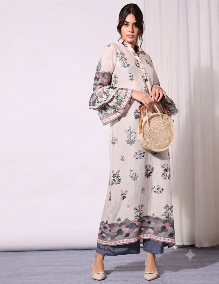 Pastel Floral Printed Top with bell sleeves paired with green twill pants for women, showcasing an elegant and contemporary floral co-ord silhouette.