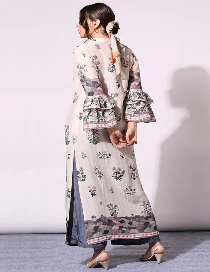 Pastel Floral Printed Top with bell sleeves paired with green twill pants for women, showcasing an elegant and contemporary floral co-ord silhouette.