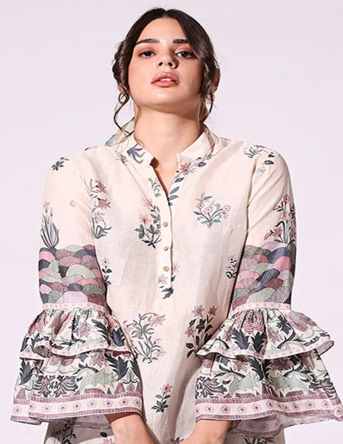 Pastel Floral Printed Top with bell sleeves paired with green twill pants for women, showcasing an elegant and contemporary floral co-ord silhouette.