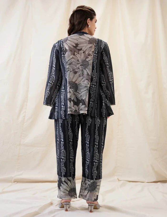 Black Noorani embellished shirt top with front tie-ups, slip and printed linen pants for women.