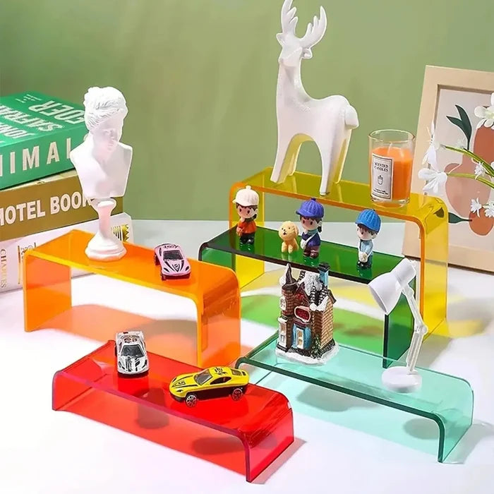Colorful acrylic display shelves with mini figurines, toy cars, and home decor accents for stylish organization.