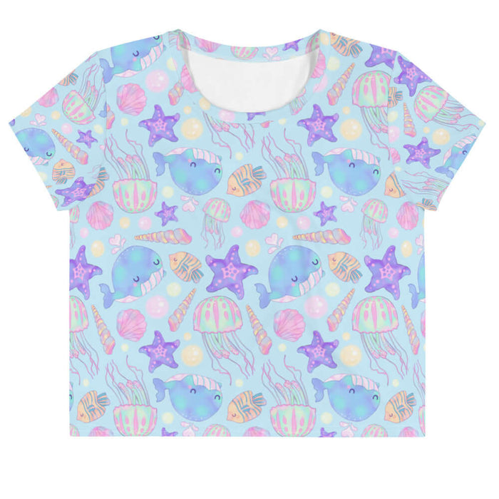 Under the Sea kawaii crop top in blue with blue narwhals and purple starfish