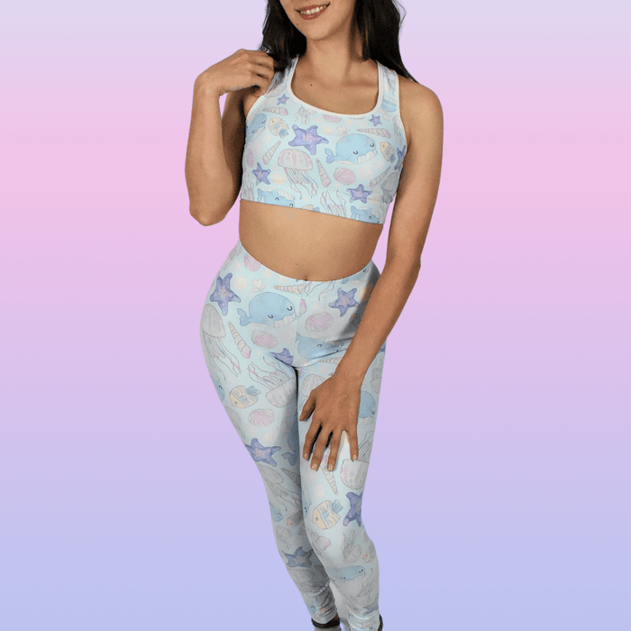 Under the Sea kawaii leggings in blue with blue narwhals and purple starfish