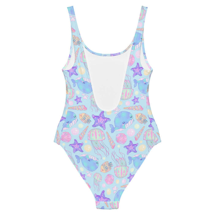 Under the Sea kawaii one-piece swimsuit in blue with blue narwhals and coral seashells