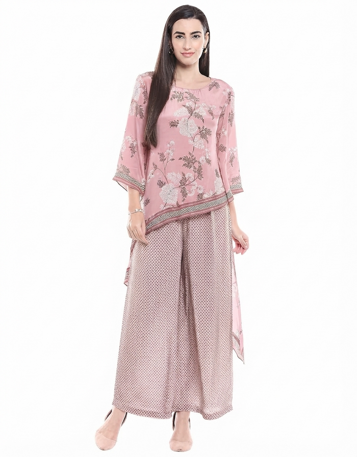 Pink Windance Printed Asymmetrical Kurta With Palazzos in crepe featuring an elegant asymmetrical silhouette and printed palazzos for women.