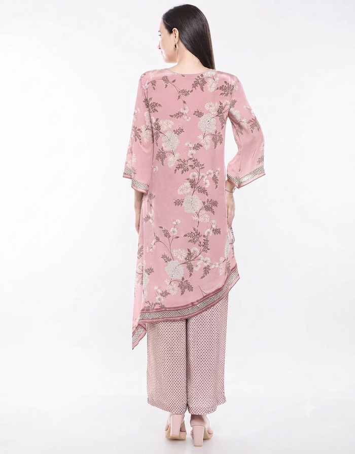 Pink Windance Printed Asymmetrical Kurta With Palazzos in crepe featuring an elegant asymmetrical silhouette and printed palazzos for women.